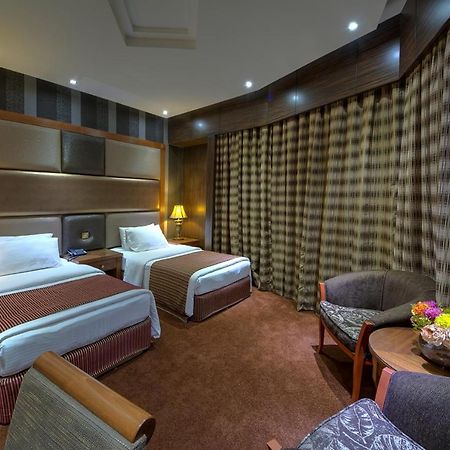 Delmon Palace Hotel Dubai Quarto foto